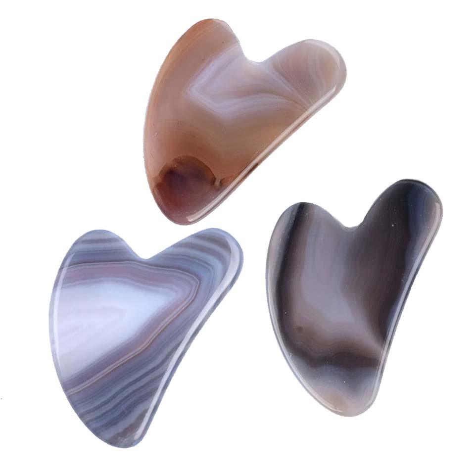 Differents gua sha agate grise