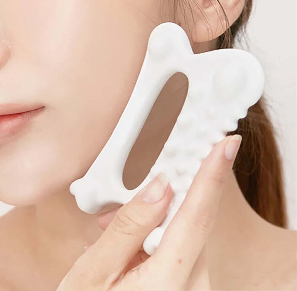 gua sha cérapique sur visage